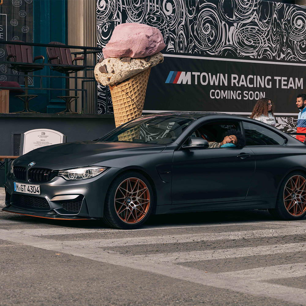 M Town Racing Team Coming Soon billboard with ice cream sculpture and BMW M4