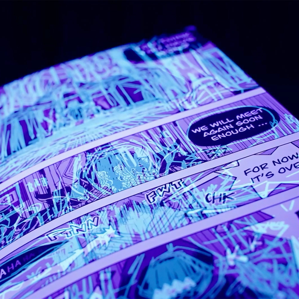 Hidden concept drawings revealed under UV blacklight showing glowing manga panels