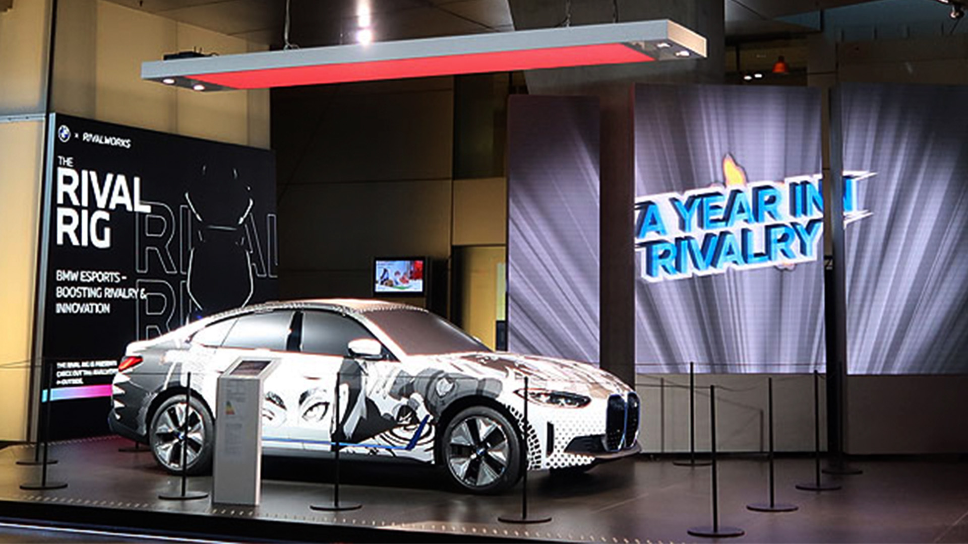 BMW i4 manga car on display at BMW Welt exhibition with Rival Rig booth