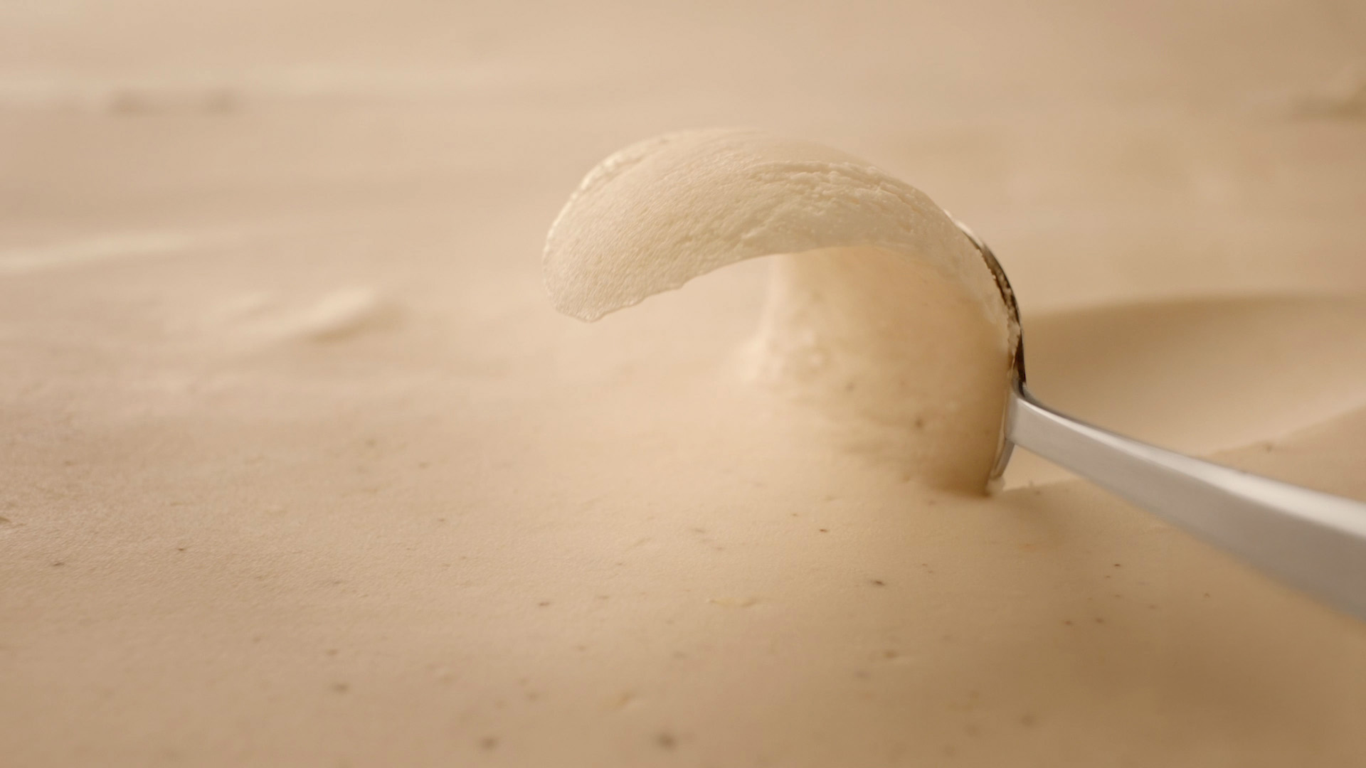 Thick Shake cream swirl close-up with spoon